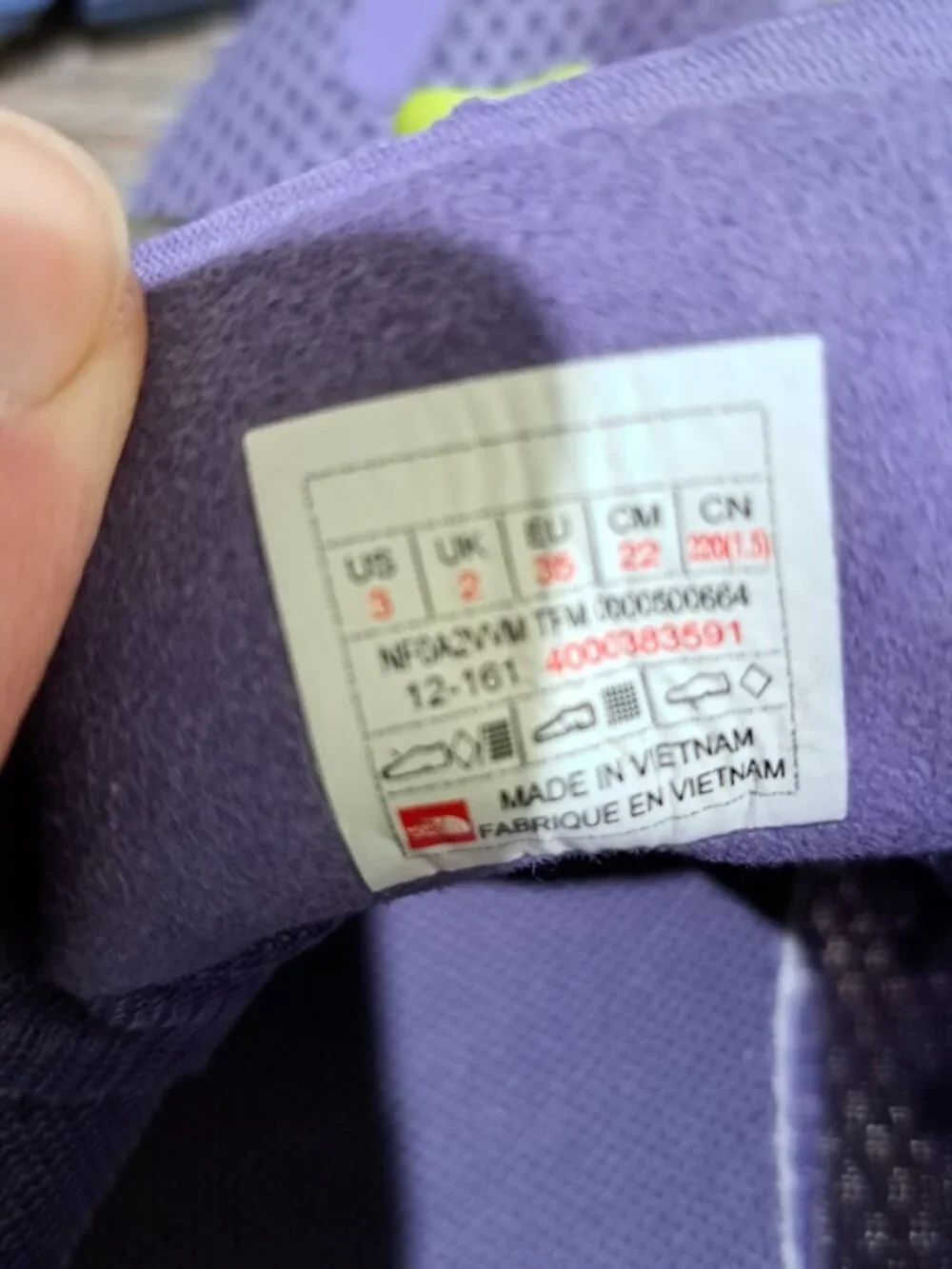 The North Face Litewave Flow Kids' water shoes purple and green with mesh upper